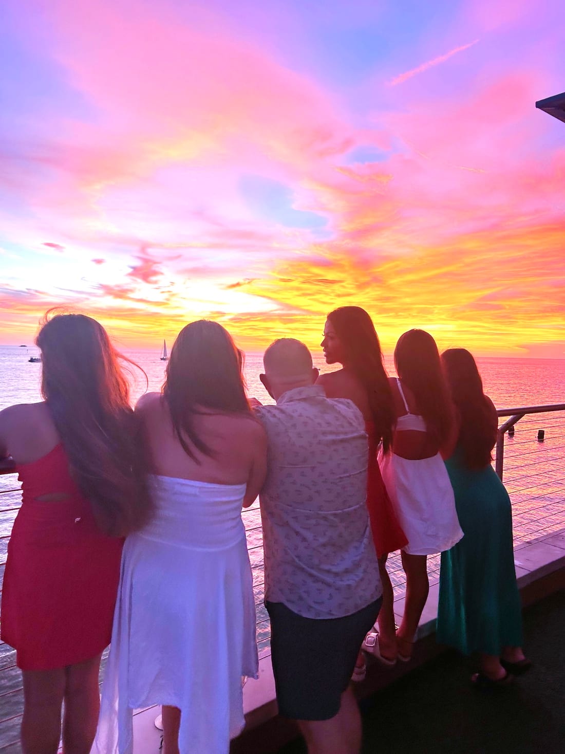 Kallie and her family watching the sunset