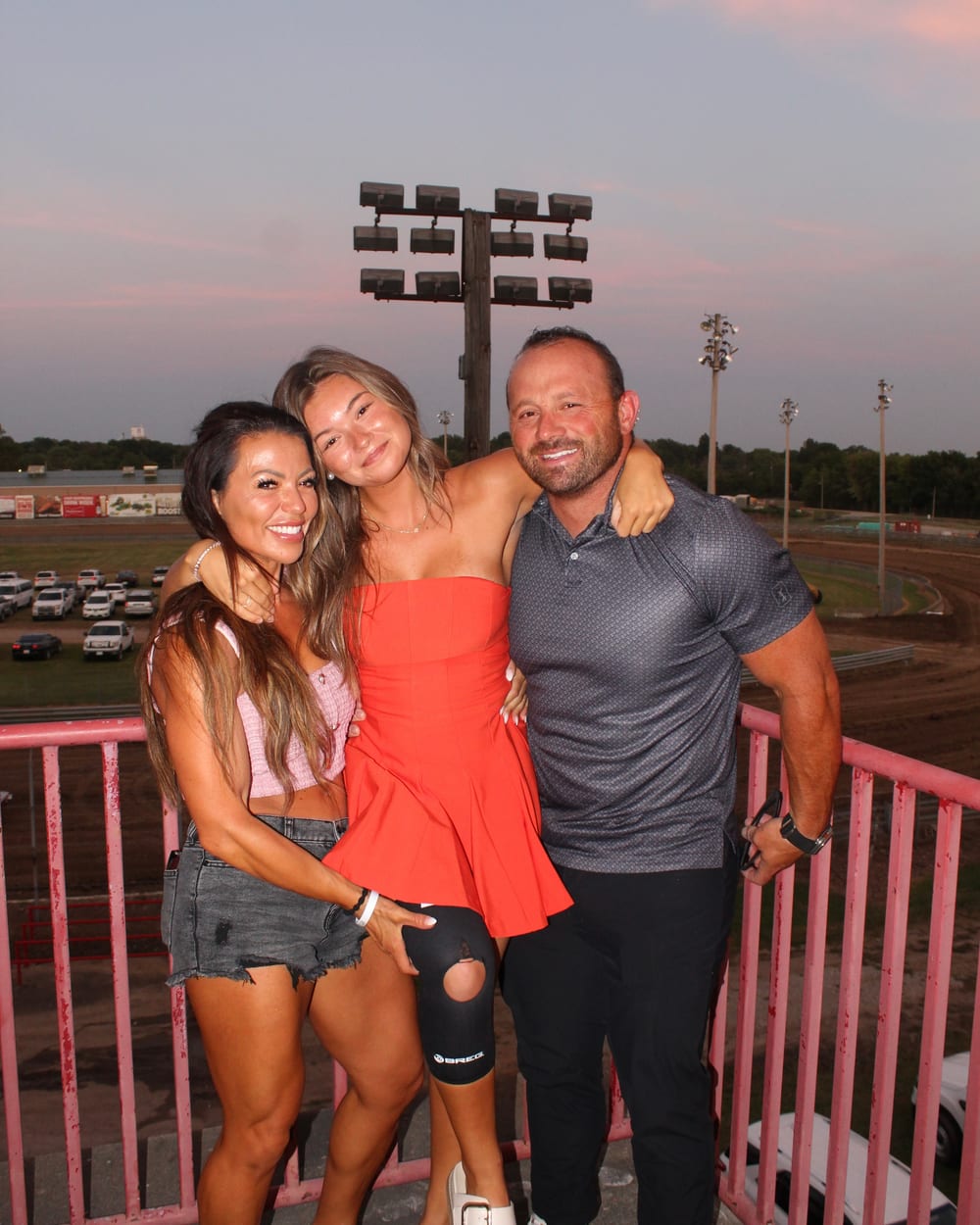 Kallie with her parents, her biggest supporters